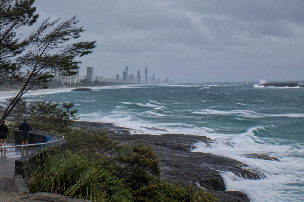Whitecaps on open ocean near a coastal seaway entrance