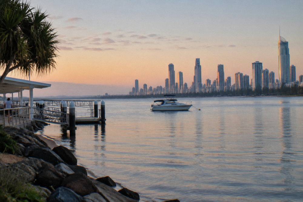 An empty stretch of ocean with the Gold Coast skyline in the distance